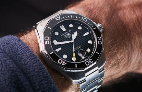 tag heuer aquaracer on wrist.